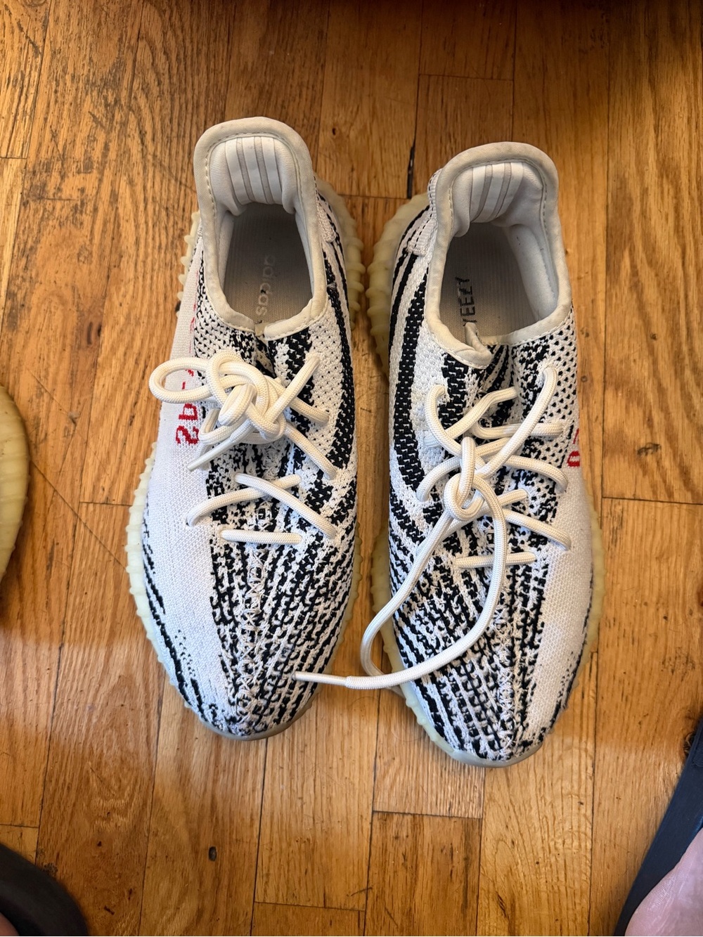 Yeezy Boost 350 V2 White & Black Zebra Sneakers with Red Accents
